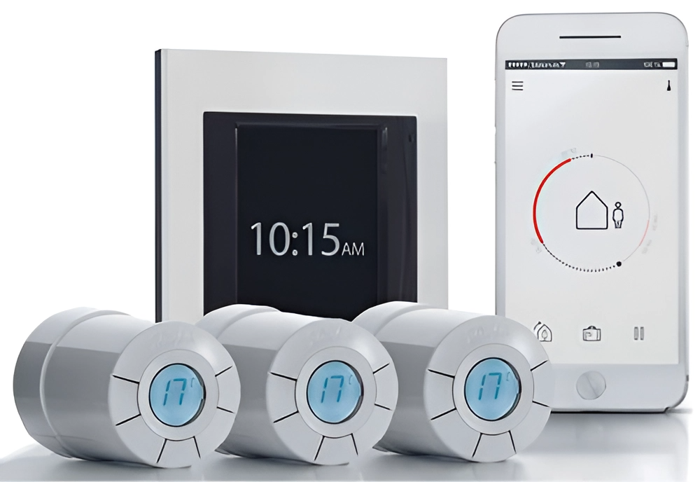 Управление через телефон температурой термоголовок, которые подключены к радиатору или полотенцесушитель. Возможность дистанционно изменять температуру. Телефон с программой, рядом с термоголовками и экраном с температурой